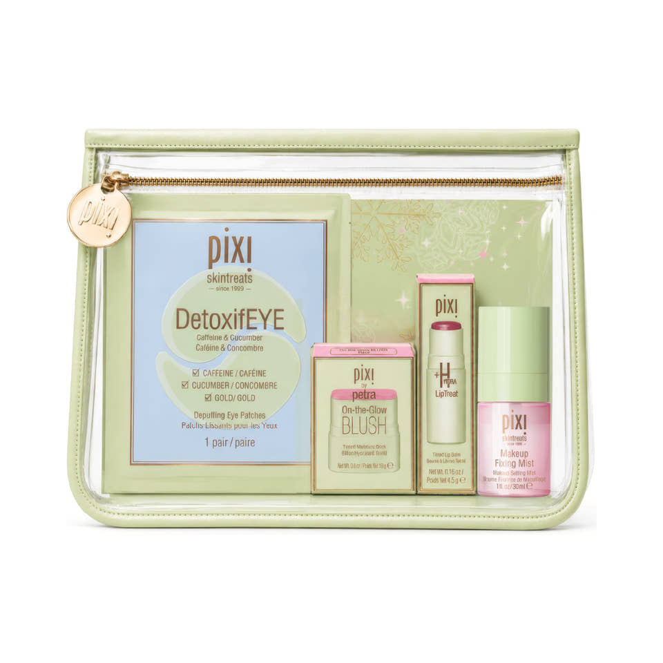 A clear zippered cosmetic pouch with a pale green border and gold zipper, containing Pixi skincare products including DetoxiEYE, Blush, and All-In-One Fixing Mint on a white background. view 2
