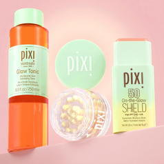 Pixi skincare products including Glow Tonic, On-the-Glow Shield SPF 50, and Vitamin-C CremeSerum on a pink background