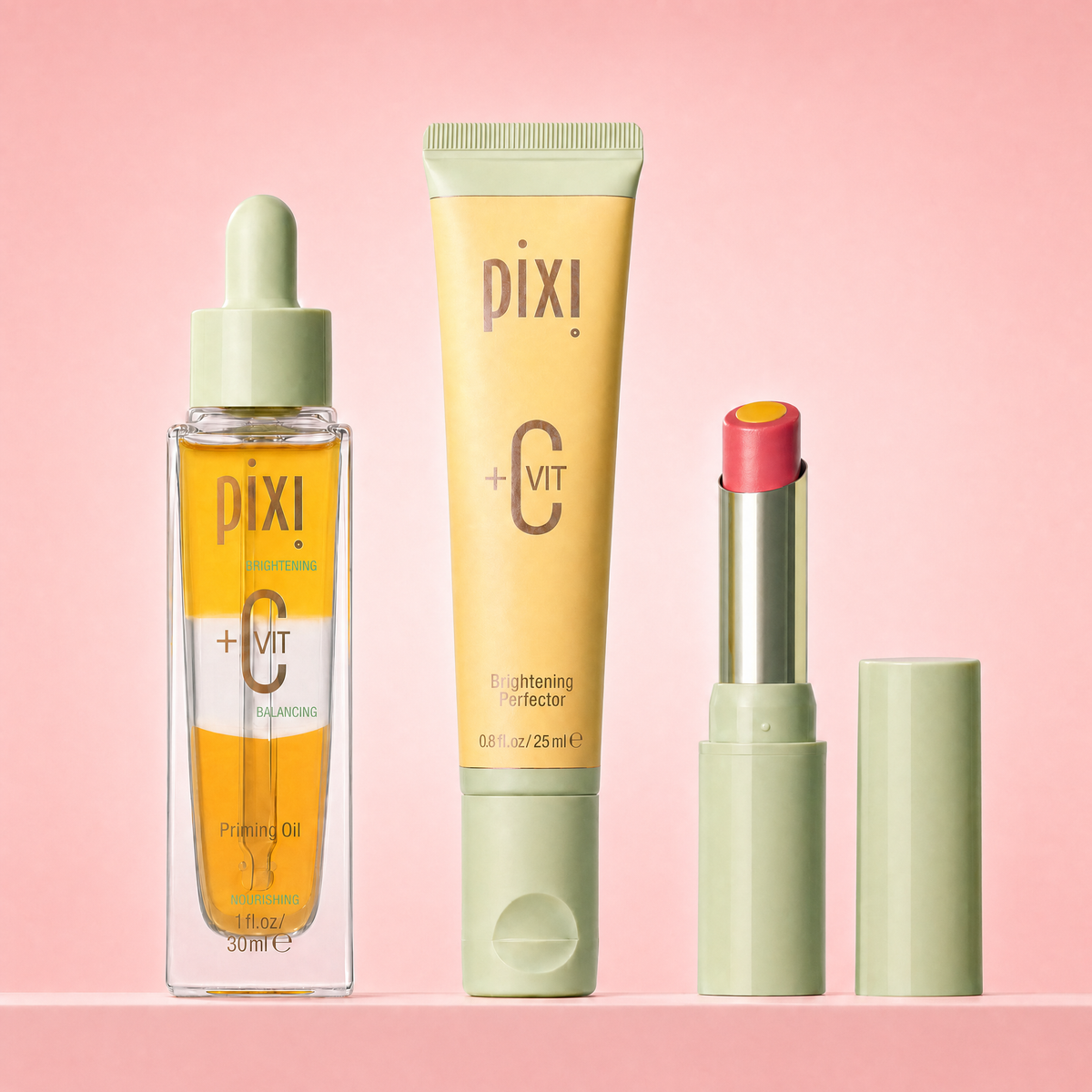 Bundle shown on a pink background featuring +C Vit Priming Oil, Brightening Perfector, and Lip Brightener